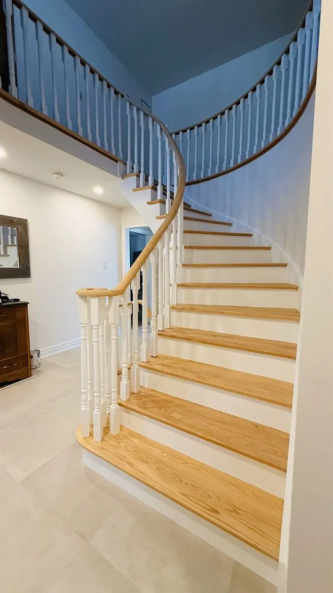 Refinished staircase with Bona Traffic HD clear coat in Mississauga