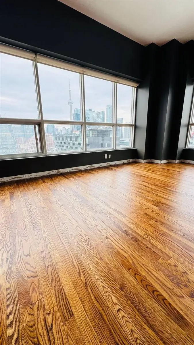 Oak hardwood floor refinished with stain and 3 coats of varnish in Toronto