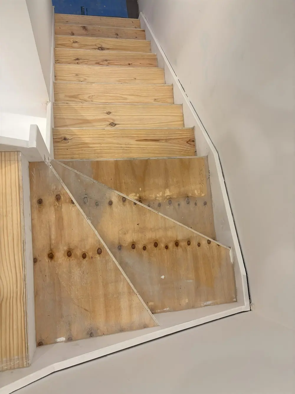 Engineered floor before refinishing in North York