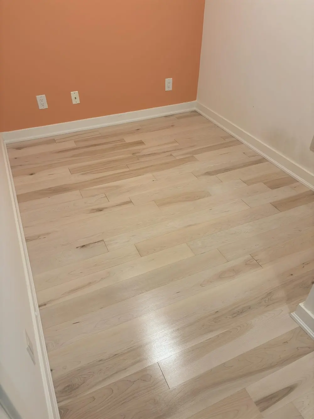 Hardwood floor refinished with white stain in Toronto